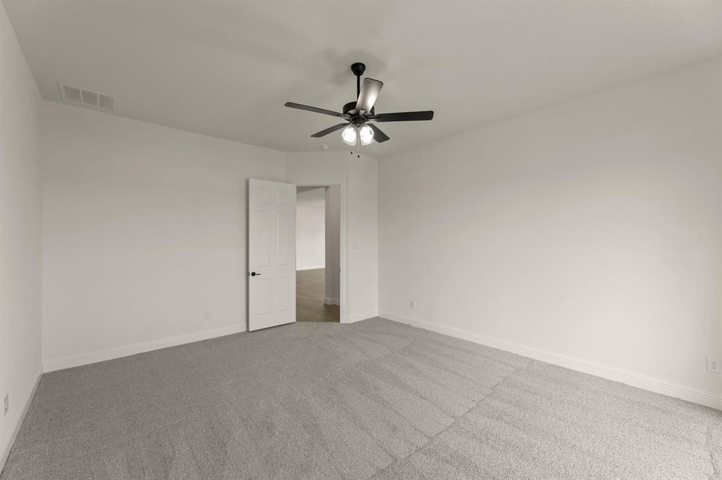 124 Evanston Court Rhome, TX 76078 - Photo 15 of 28 124 Evanston-Primary Suite-2