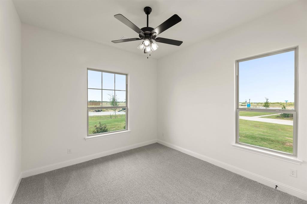 124 Evanston Court Rhome, TX 76078 - Photo 21 of 28 124 Evanston-Bedroom-1