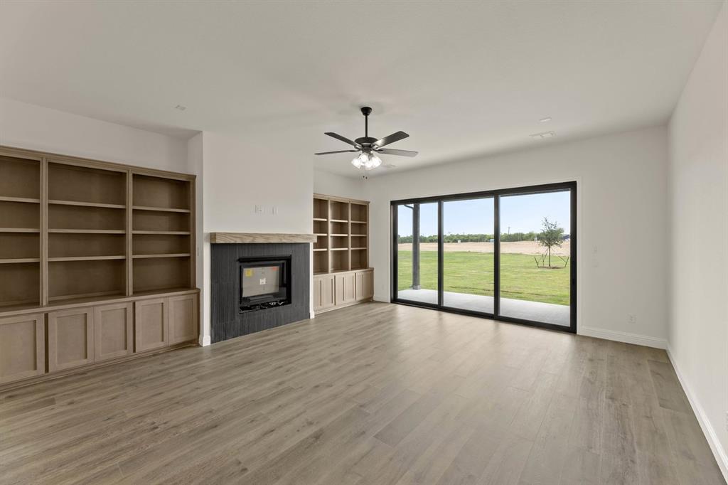 124 Evanston Court Rhome, TX 76078 - Photo 6 of 28 124 Evanston-Living Room-1