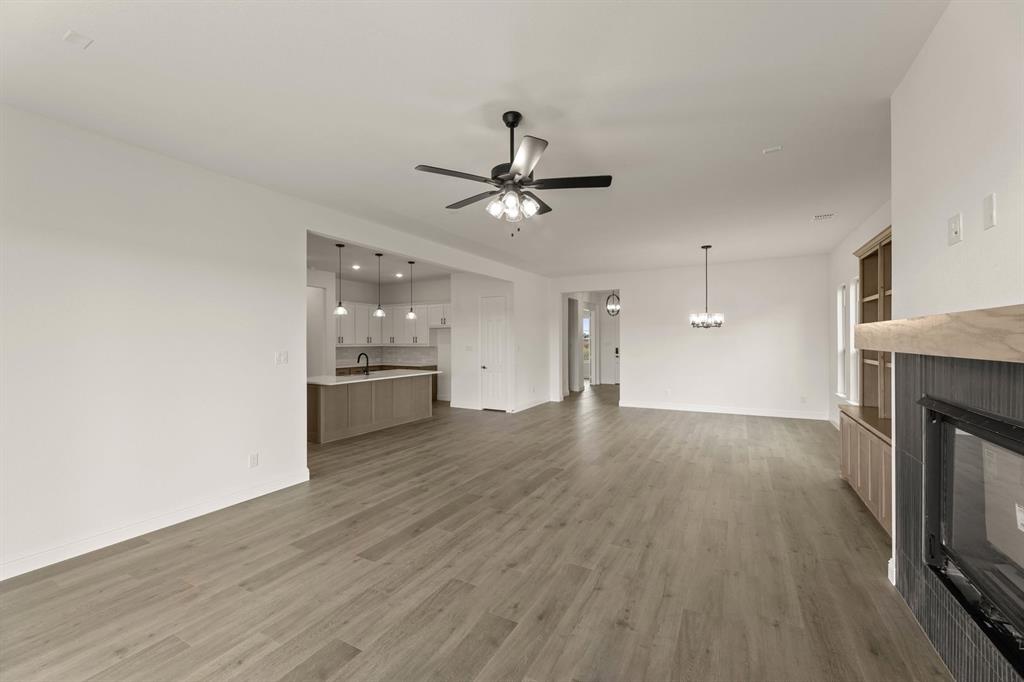 124 Evanston Court Rhome, TX 76078 - Photo 7 of 28 124 Evanston-Living Room-2