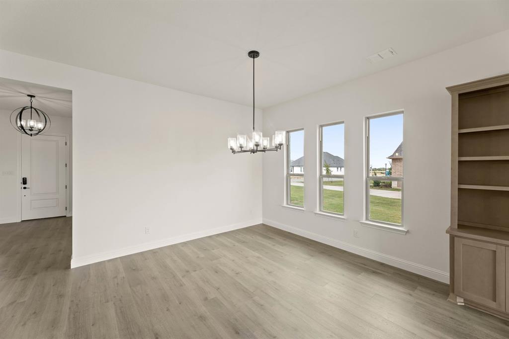 124 Evanston Court Rhome, TX 76078 - Photo 8 of 28 124 Evanston-Dining-1