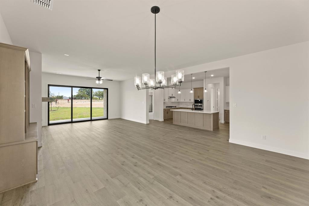 124 Evanston Court Rhome, TX 76078 - Photo 9 of 28 124 Evanston-Dining-2