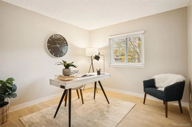 a view of a workspace with furniture