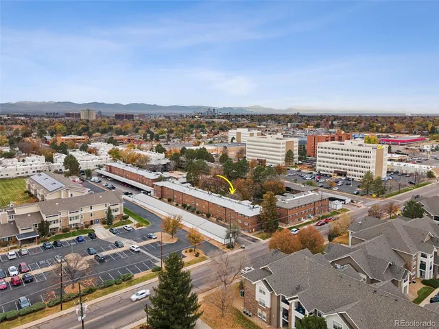 an aerial view of a city with lots of residential buildings