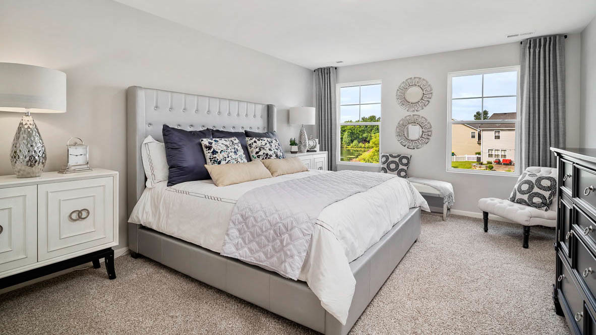 1810 Legacy Pointe Boulevard Plainfield, IL 60586 - Photo 13 of 20 a bedroom with a bed and a window