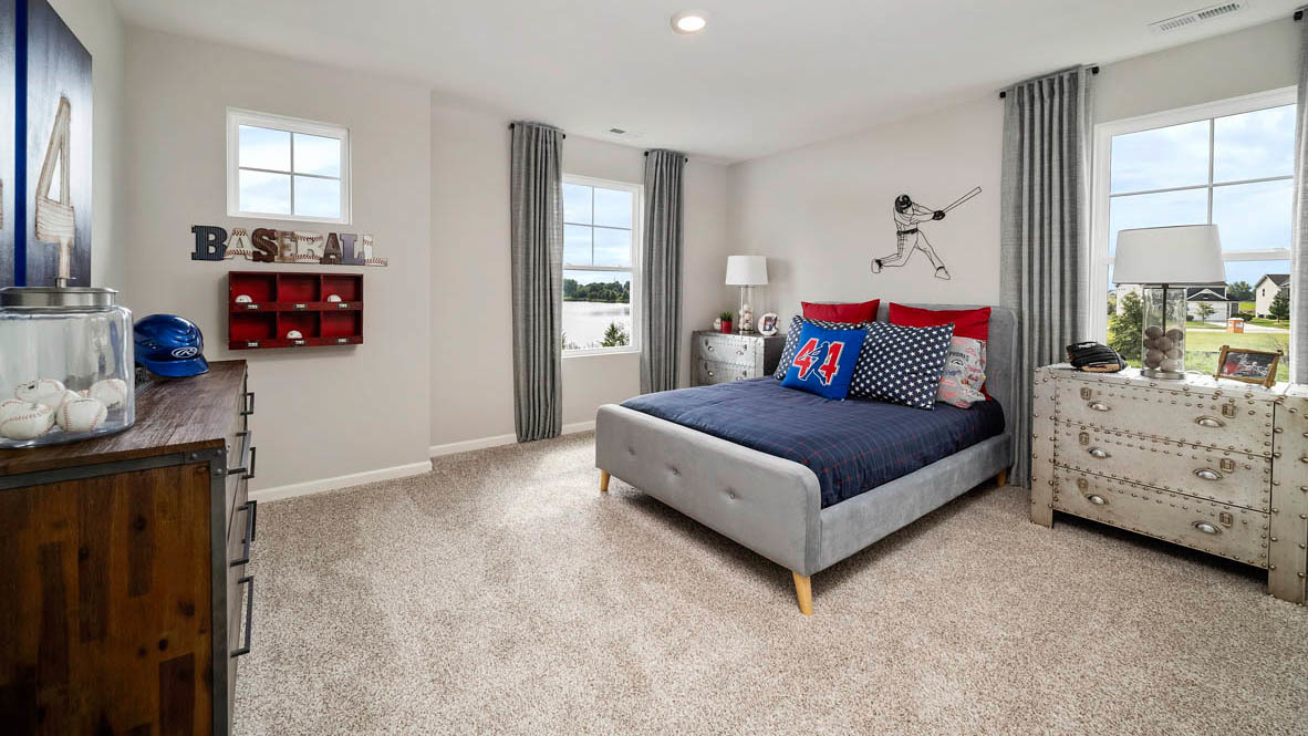 1810 Legacy Pointe Boulevard Plainfield, IL 60586 - Photo 17 of 20 a bedroom with a bed and window