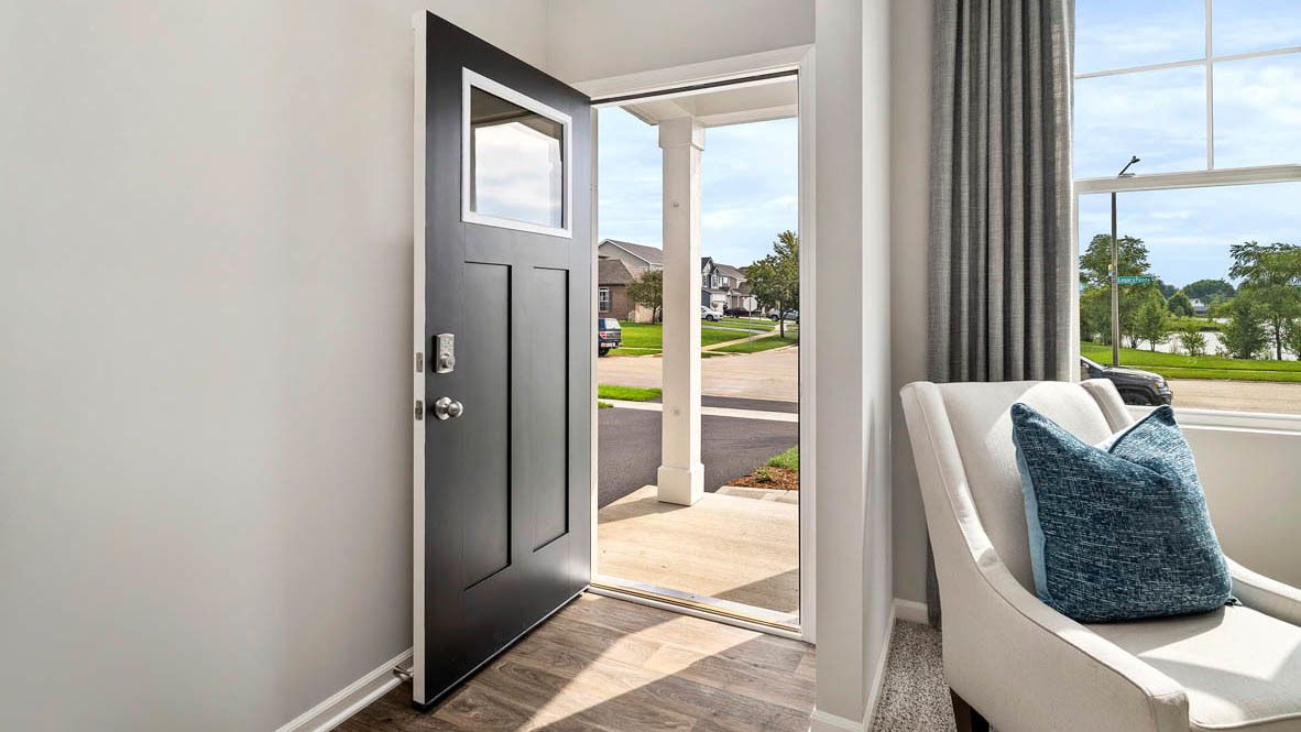 1810 Legacy Pointe Boulevard Plainfield, IL 60586 - Photo 2 of 20 a room with a large window and glass door