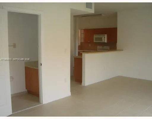a view of a bathroom with a glass door