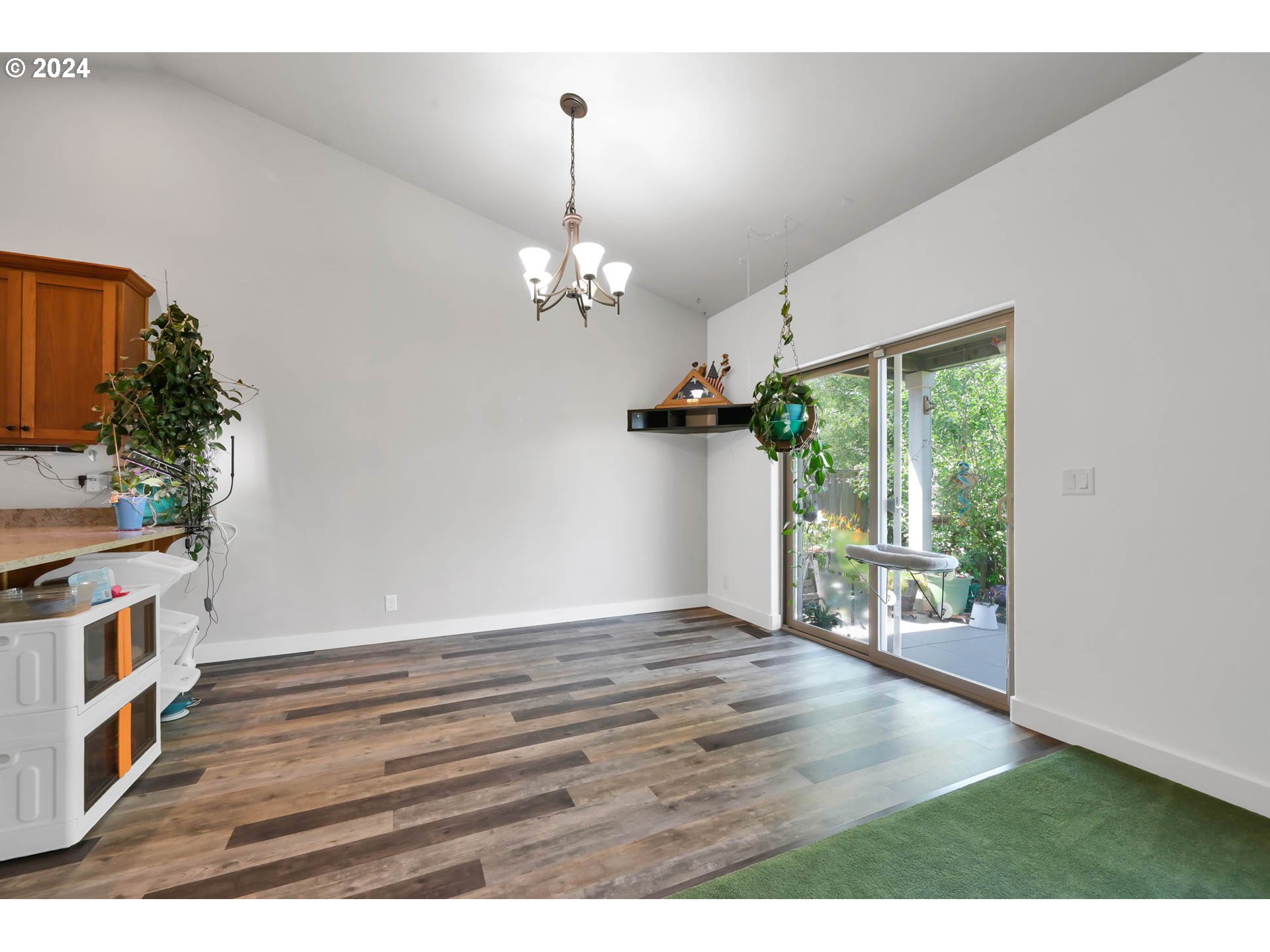 945 Pennington Court Eugene, OR 97404 - Photo 17 of 40 a view of an empty room with a window