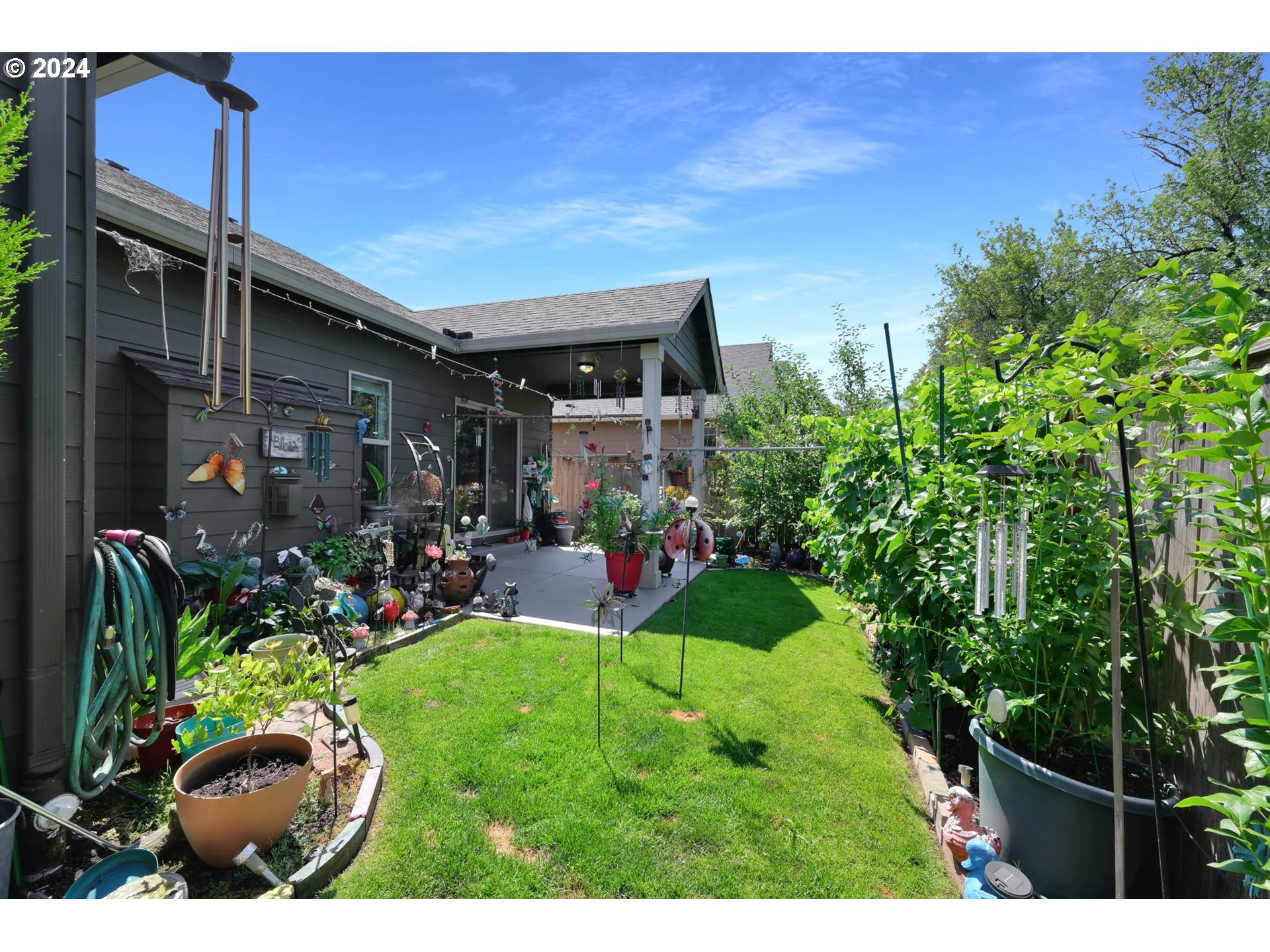 945 Pennington Court Eugene, OR 97404 - Photo 33 of 40 a view of yard with patio