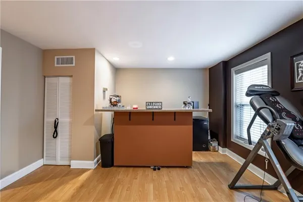 a view of a room with gym equipment