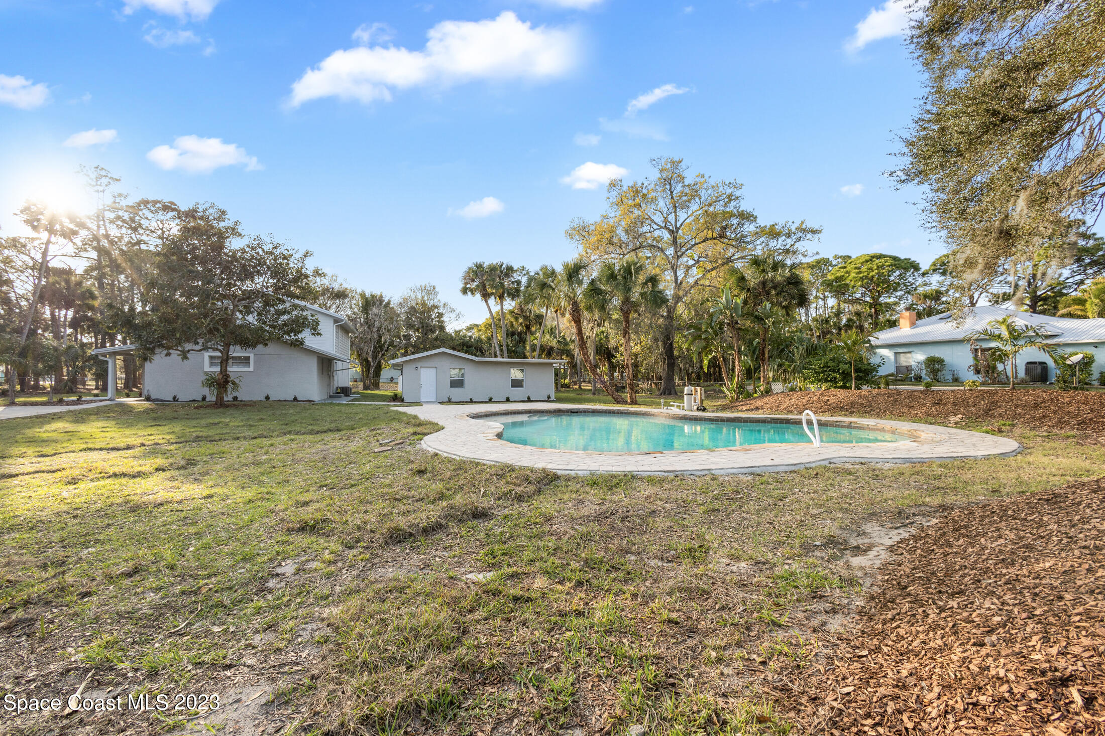 2300 Cox Road Cocoa, FL 32926 - Photo 33 of 41 a view of a house with a yard