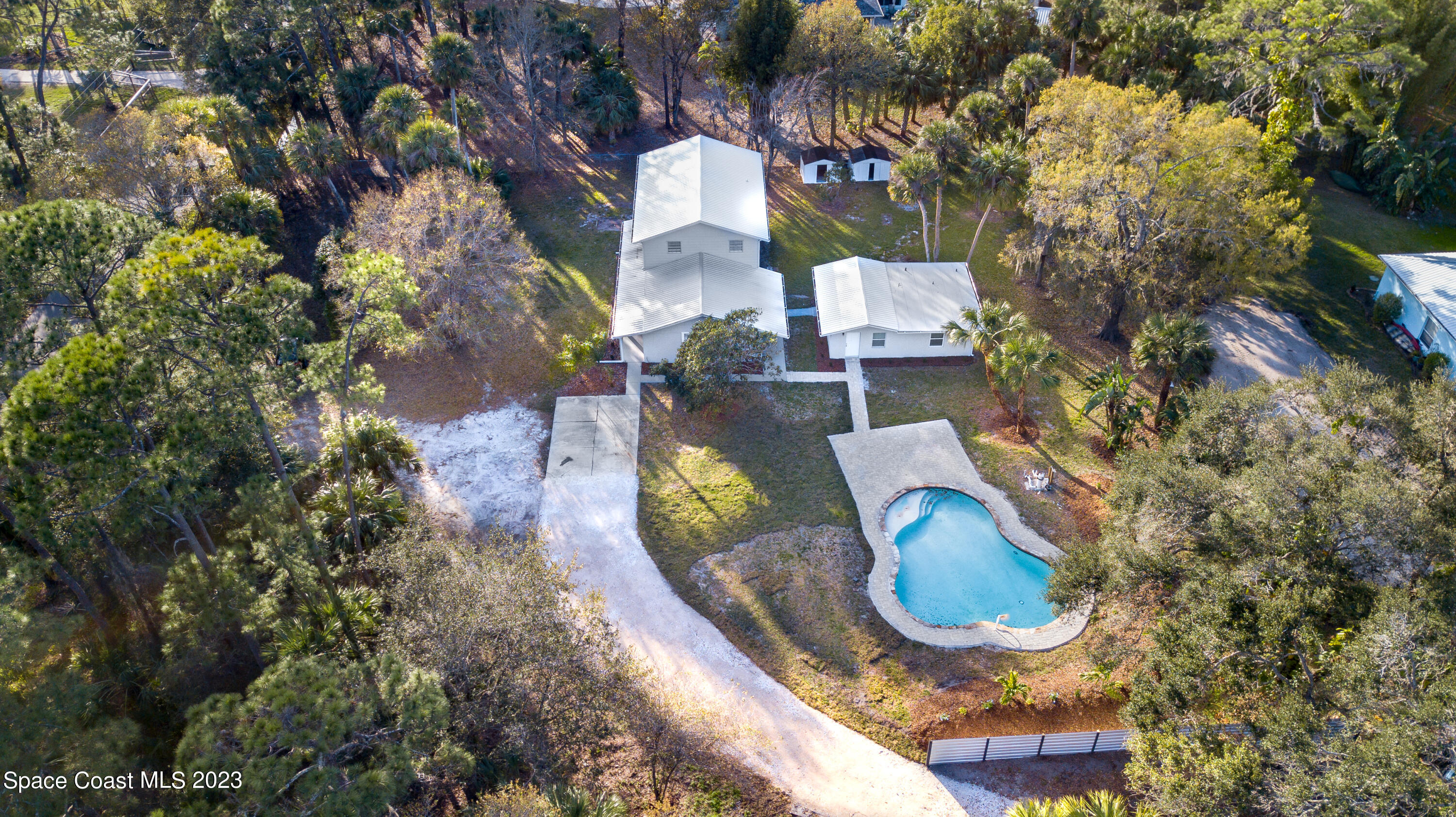 2300 Cox Road Cocoa, FL 32926 - Photo 35 of 41 an aerial view of a house with outdoor space swimming pool
