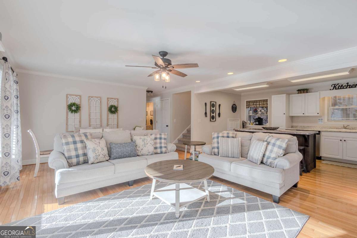 53 Addle Trail, Unit 2382 Ellijay, GA 30540 - Photo 15 of 42 a living room with furniture and view of kitchen