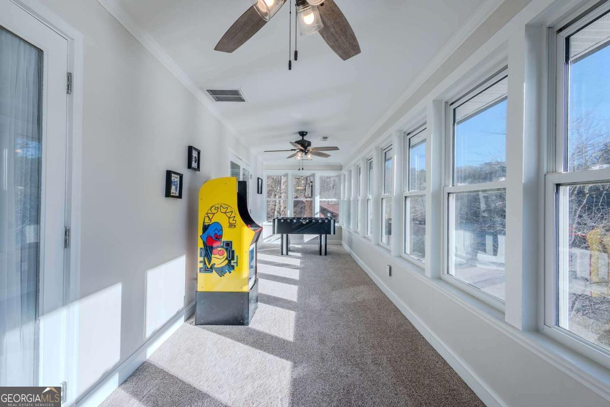 53 Addle Trail, Unit 2382 Ellijay, GA 30540 - Photo 35 of 42 a view of a hallway with a yellow slide