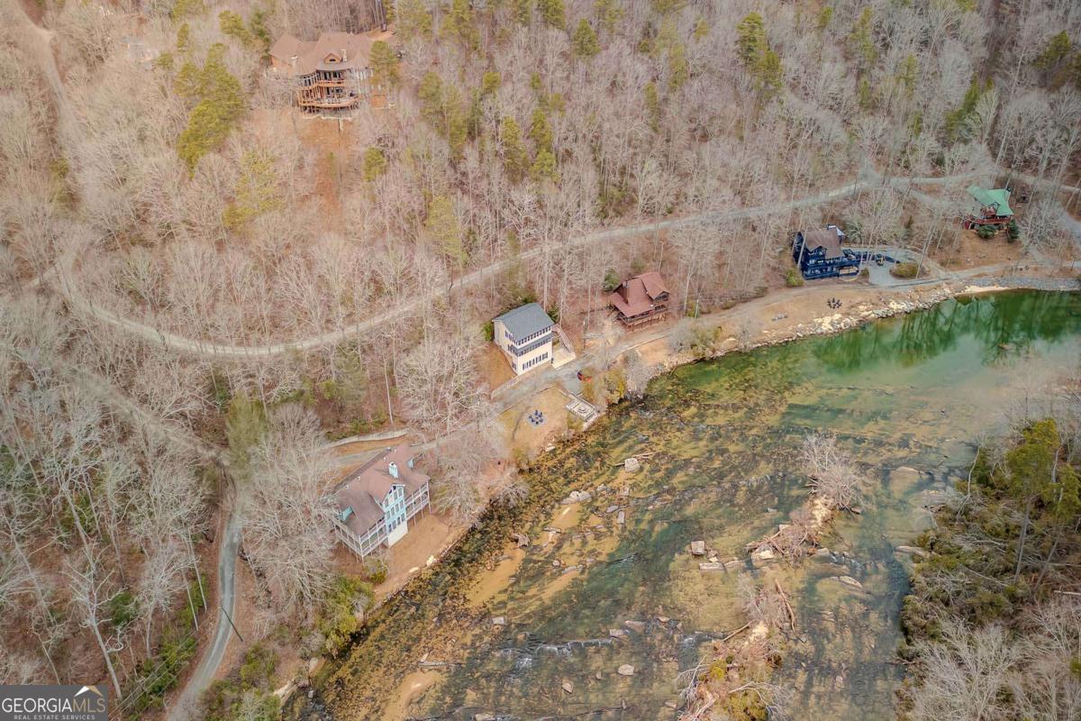 53 Addle Trail, Unit 2382 Ellijay, GA 30540 - Photo 42 of 42 a view of a dry yard with wooden fence