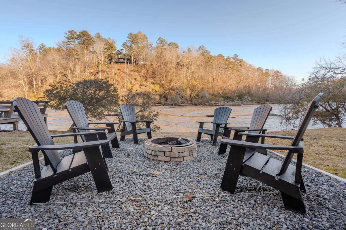 53 Addle Trail, Unit 2382 Ellijay, GA 30540 - Photo 5 of 42 a view of a terrace with chairs