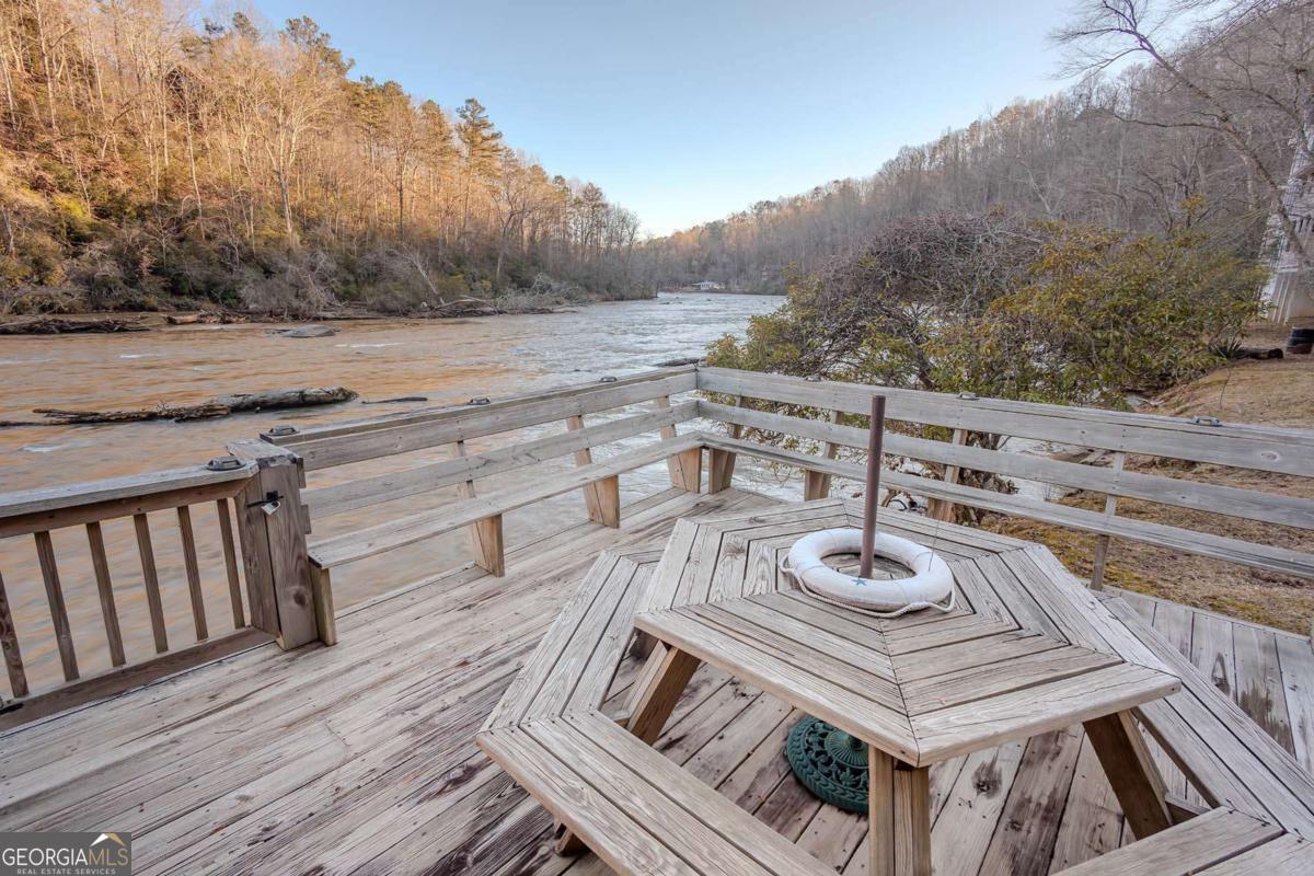 53 Addle Trail, Unit 2382 Ellijay, GA 30540 - Photo 9 of 42 a view of a wooden deck and outdoor space