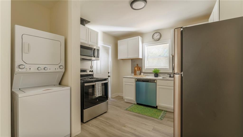 1365 Campbellton Road Southwest Atlanta, GA 30310 - Photo 13 of 36 a kitchen with a stove top oven and sink