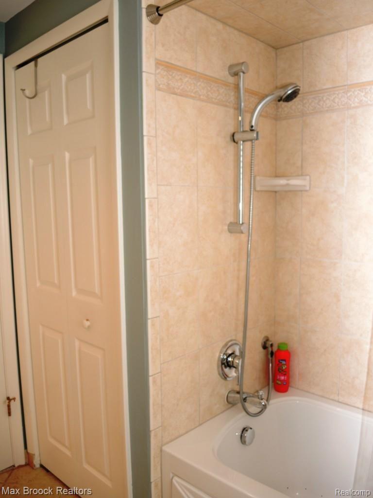 4466 Beach Road Troy, MI 48098 - Photo 31 of 45 HALL CERAMIC SHOWER & LINEN CLOSET