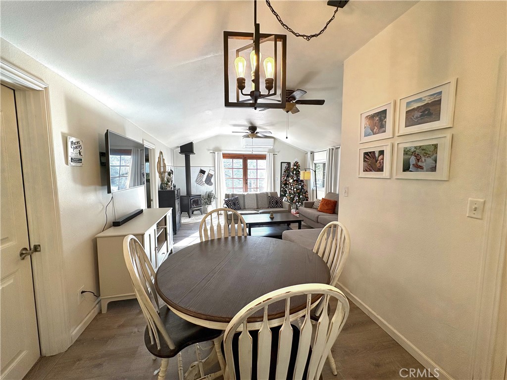 36750 Hilltop Road Yucaipa, CA 92399 - Photo 12 of 27 a dining room with furniture and window