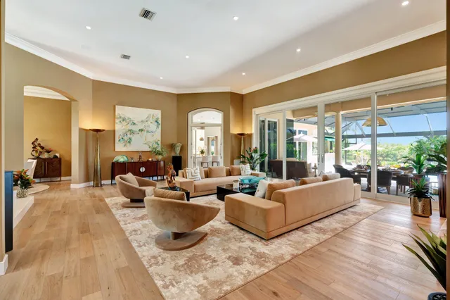 a bedroom with furniture and a flat screen tv