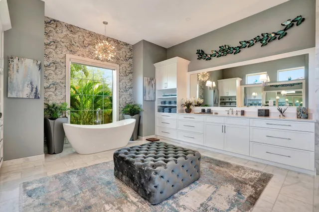 an aerial view of a house with a garden and swimming pool