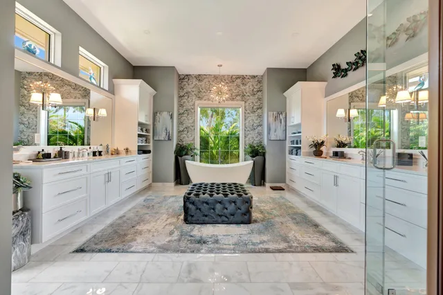 an aerial view of a house with garden space and street view