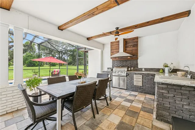 a patio with a table and chairs