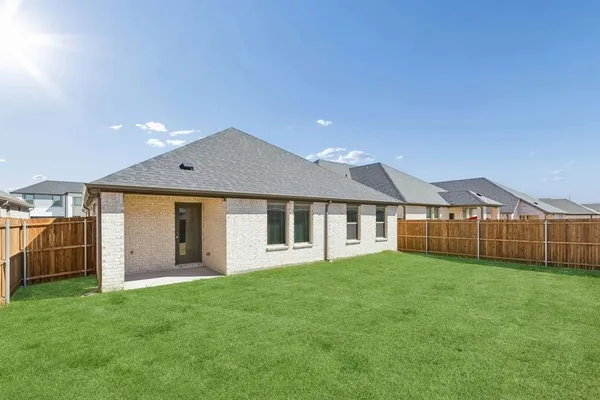an empty room with closet area