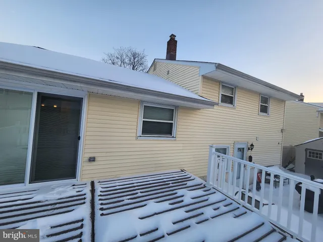 a view of a house with stairs and wooden floor