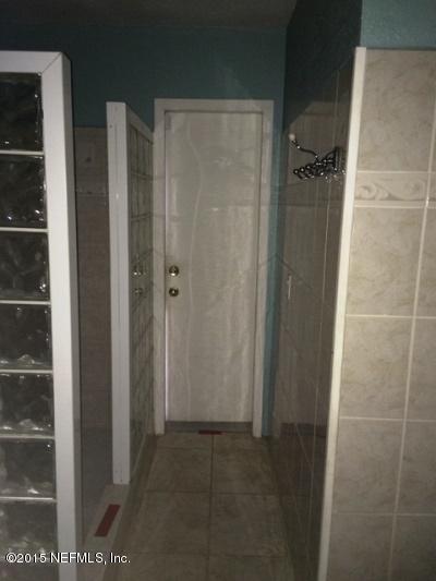 6520 Diane Road Jacksonville, FL 32277 - Photo 13 of 16 a bathroom with a shower