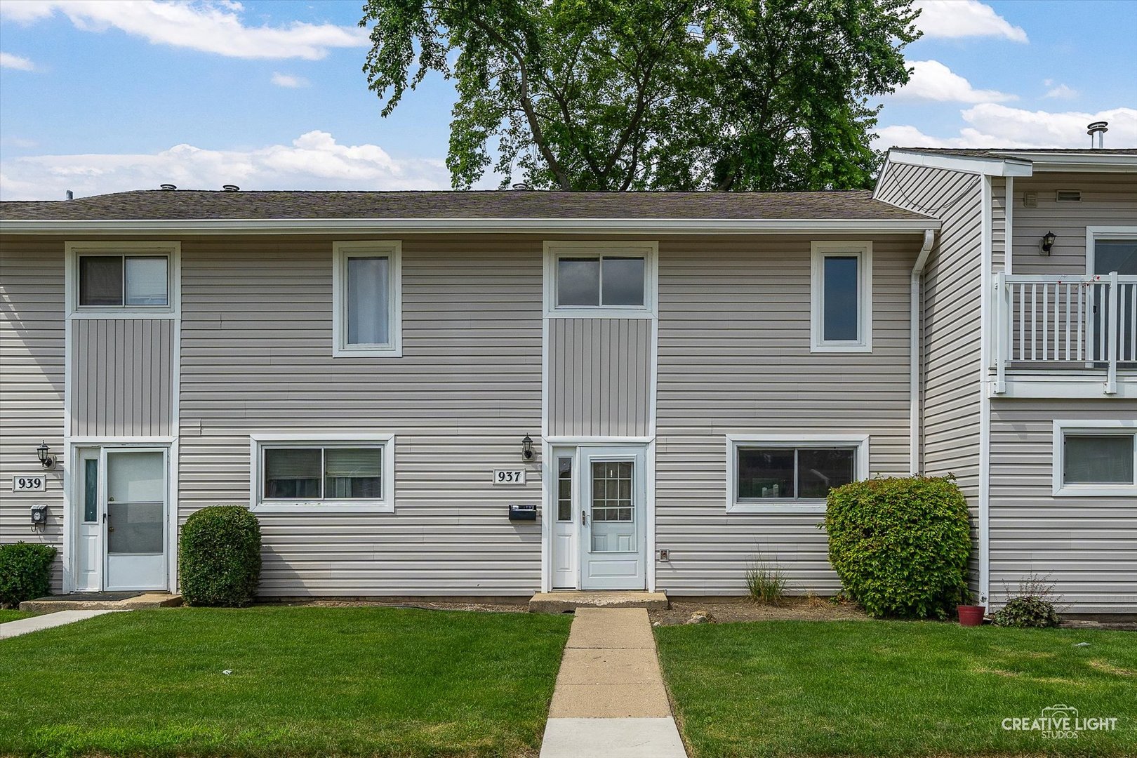 937 Sandpiper Court Bartlett, IL 60103 - Photo 1 of 17 a view front of house with a yard