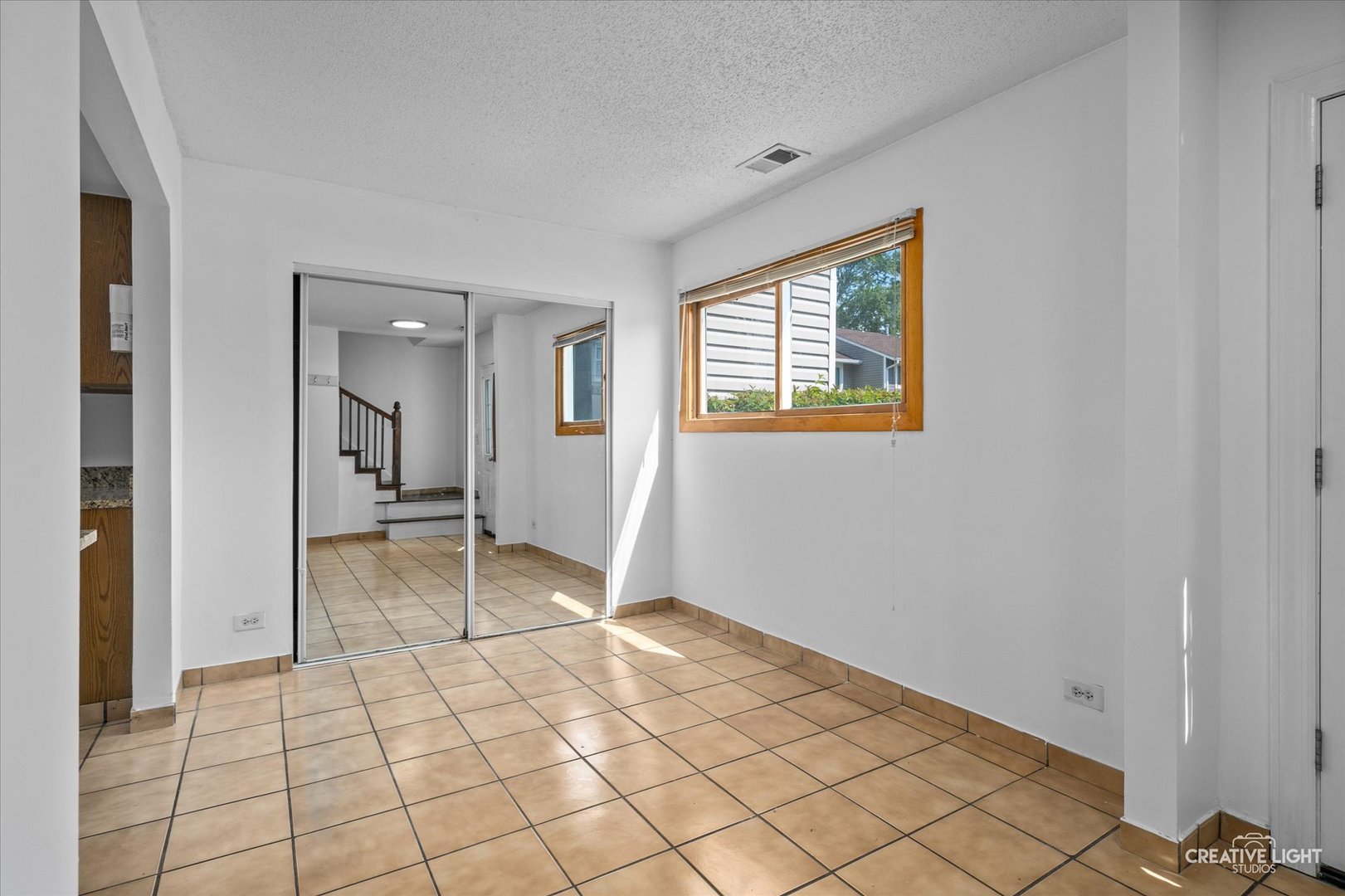 937 Sandpiper Court Bartlett, IL 60103 - Photo 2 of 17 a view of an empty room and window