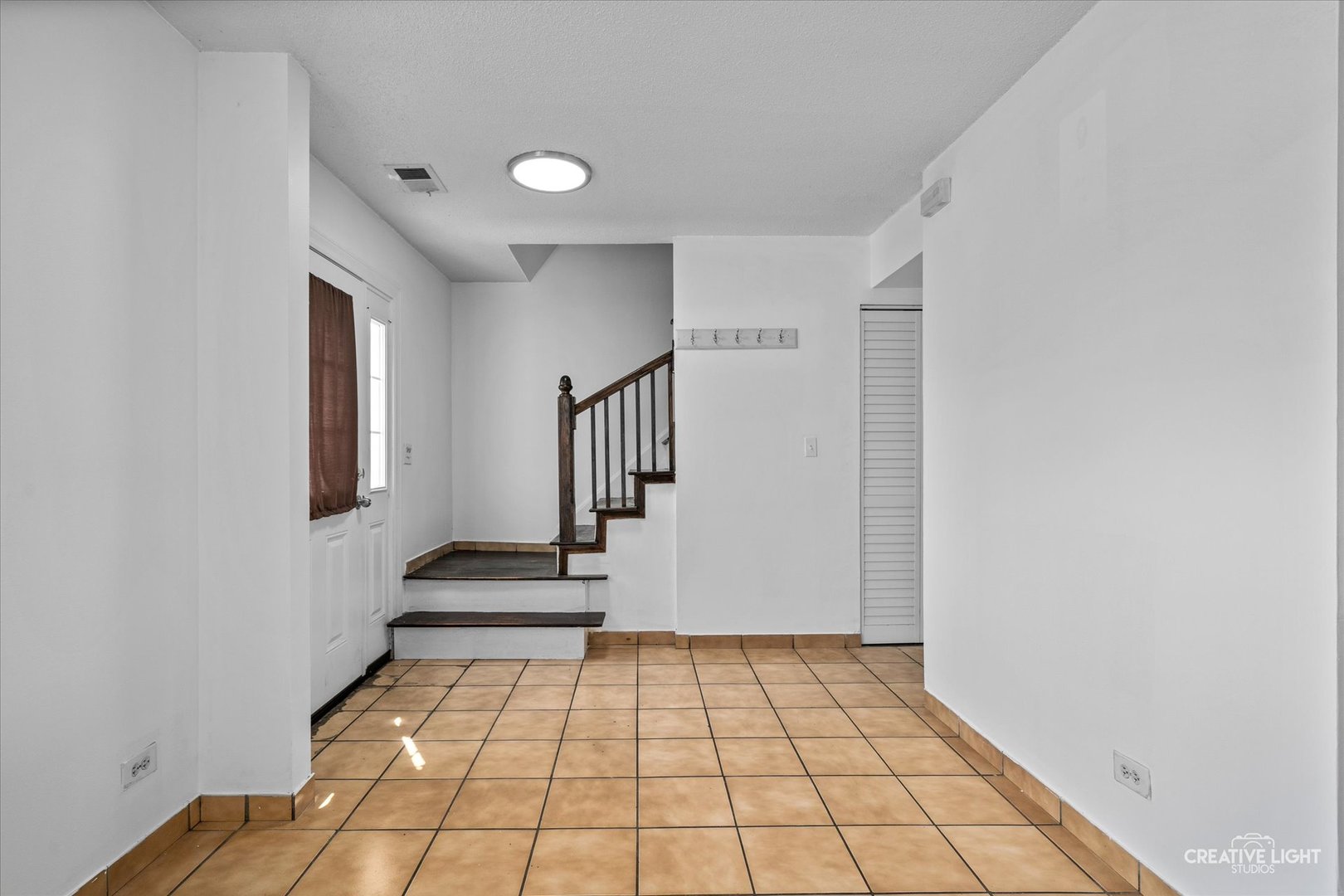937 Sandpiper Court Bartlett, IL 60103 - Photo 3 of 17 a view of a room with a staircase