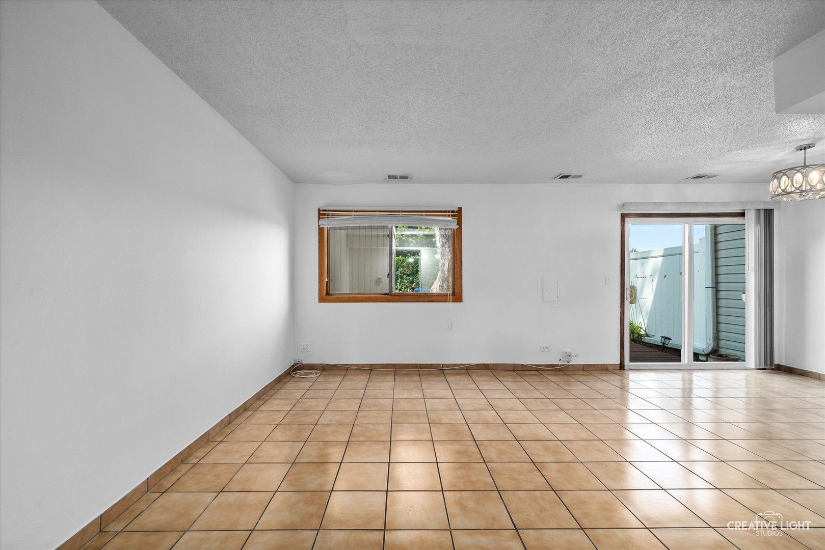 937 Sandpiper Court Bartlett, IL 60103 - Photo 7 of 17 a view of an empty room and window