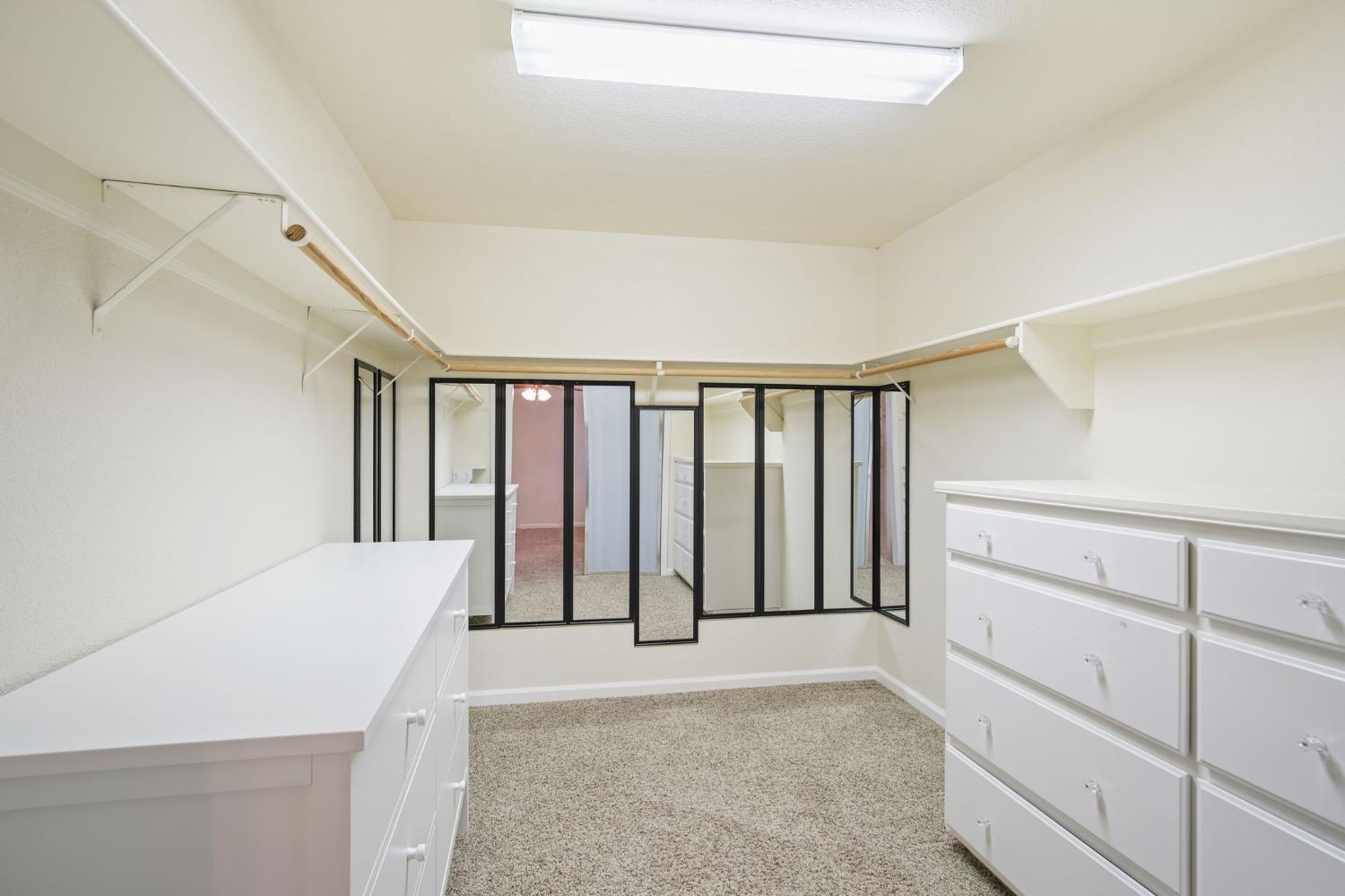 845 Pointe Lourose Avenue Gustine, CA 95322 - Photo 24 of 34 a view of a hallway with closet