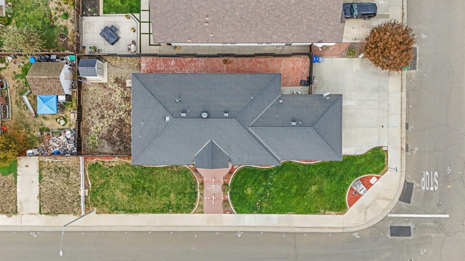 845 Pointe Lourose Avenue Gustine, CA 95322 - Photo 30 of 34 an aerial view of a house with a yard and lake view