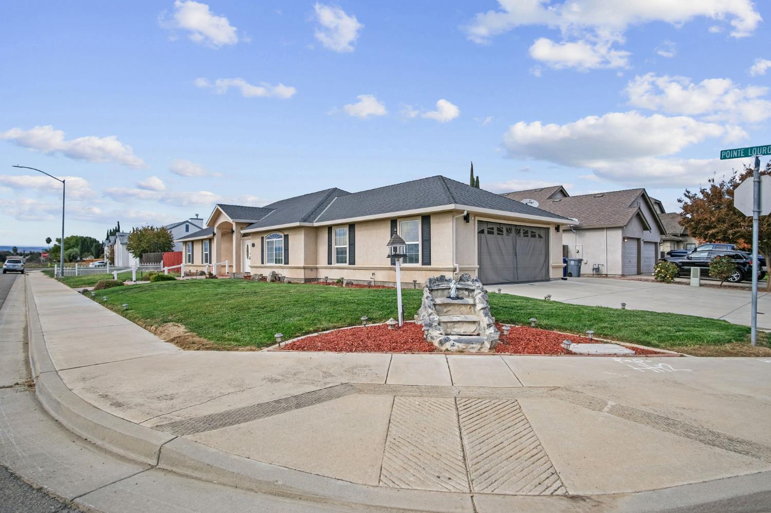 845 Pointe Lourose Avenue Gustine, CA 95322 - Photo 4 of 34 a view of house with a yard