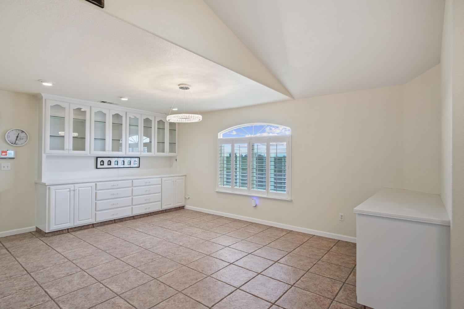 845 Pointe Lourose Avenue Gustine, CA 95322 - Photo 8 of 34 a view of an empty room with a window