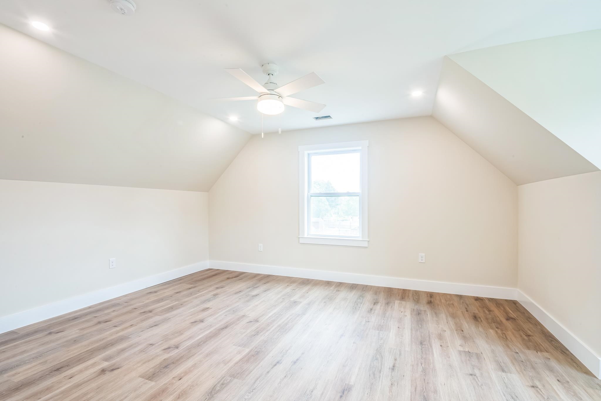 70 West Rising Sun Drive Ocean View, NJ 08230 - Photo 28 of 34 an empty room with wooden floor and windows