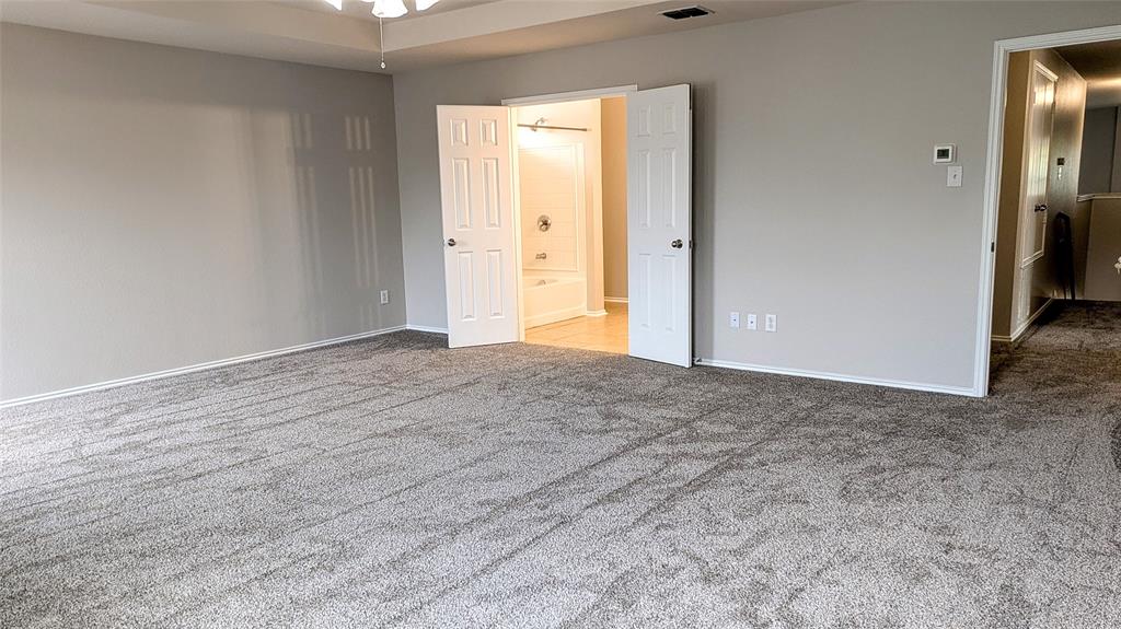 1308 Lamar Lane Allen, TX 75002 - Photo 20 of 40 Unfurnished bedroom with carpet floors and ensuite bath