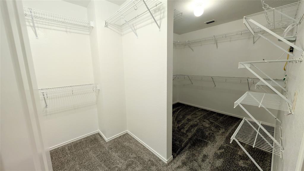 1308 Lamar Lane Allen, TX 75002 - Photo 24 of 40 Spacious closet featuring carpet
