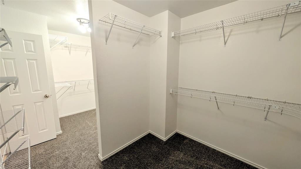1308 Lamar Lane Allen, TX 75002 - Photo 25 of 40 Spacious closet featuring carpet