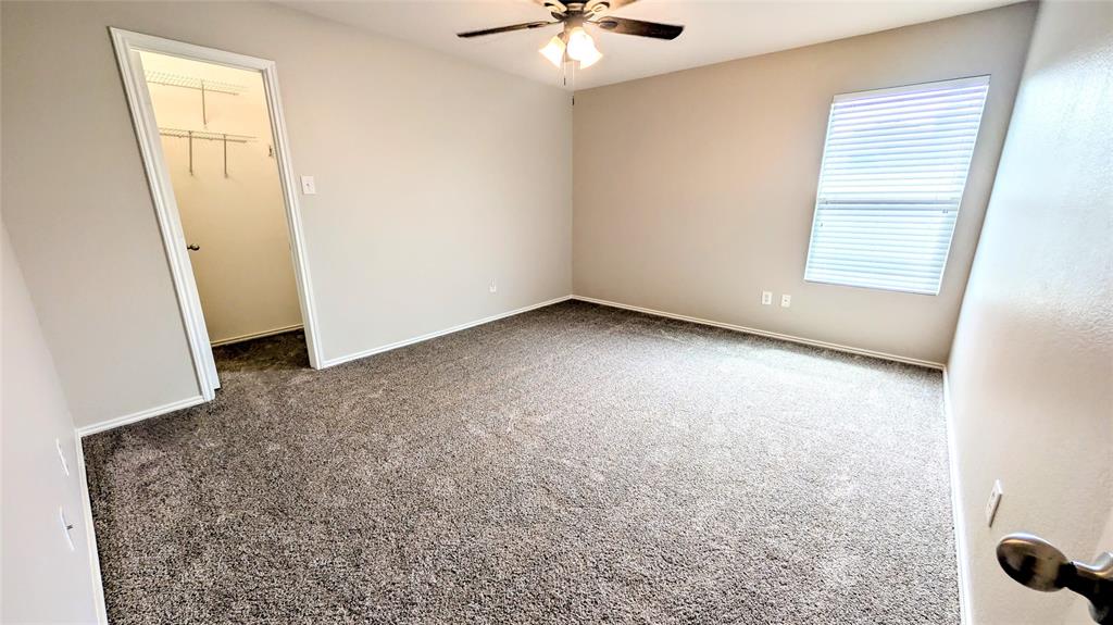 1308 Lamar Lane Allen, TX 75002 - Photo 30 of 40 Unfurnished room with carpet flooring and a ceiling fan