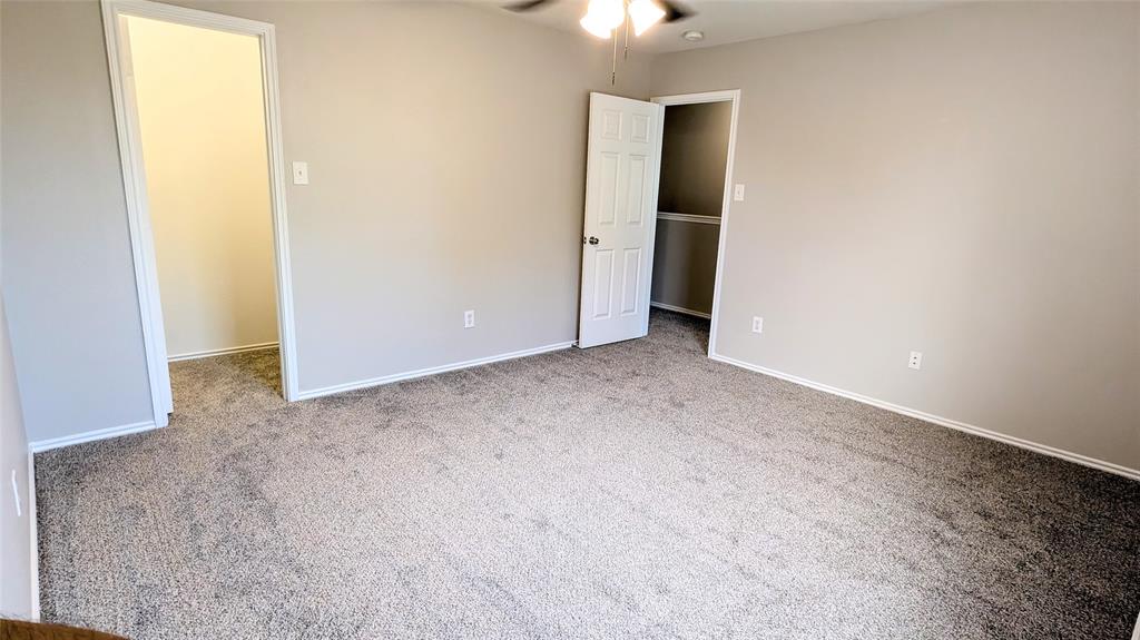 1308 Lamar Lane Allen, TX 75002 - Photo 33 of 40 Unfurnished bedroom featuring carpet floors and a spacious closet