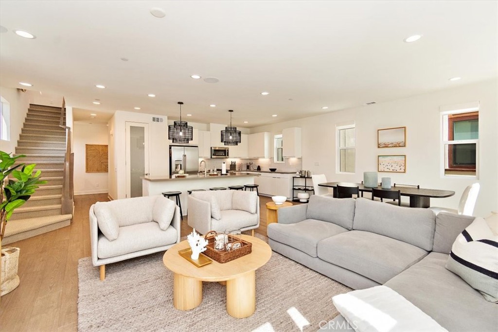 1030 Harbor Boulevard Oxnard, CA 93035 - Photo 10 of 40 a living room with furniture and a large window