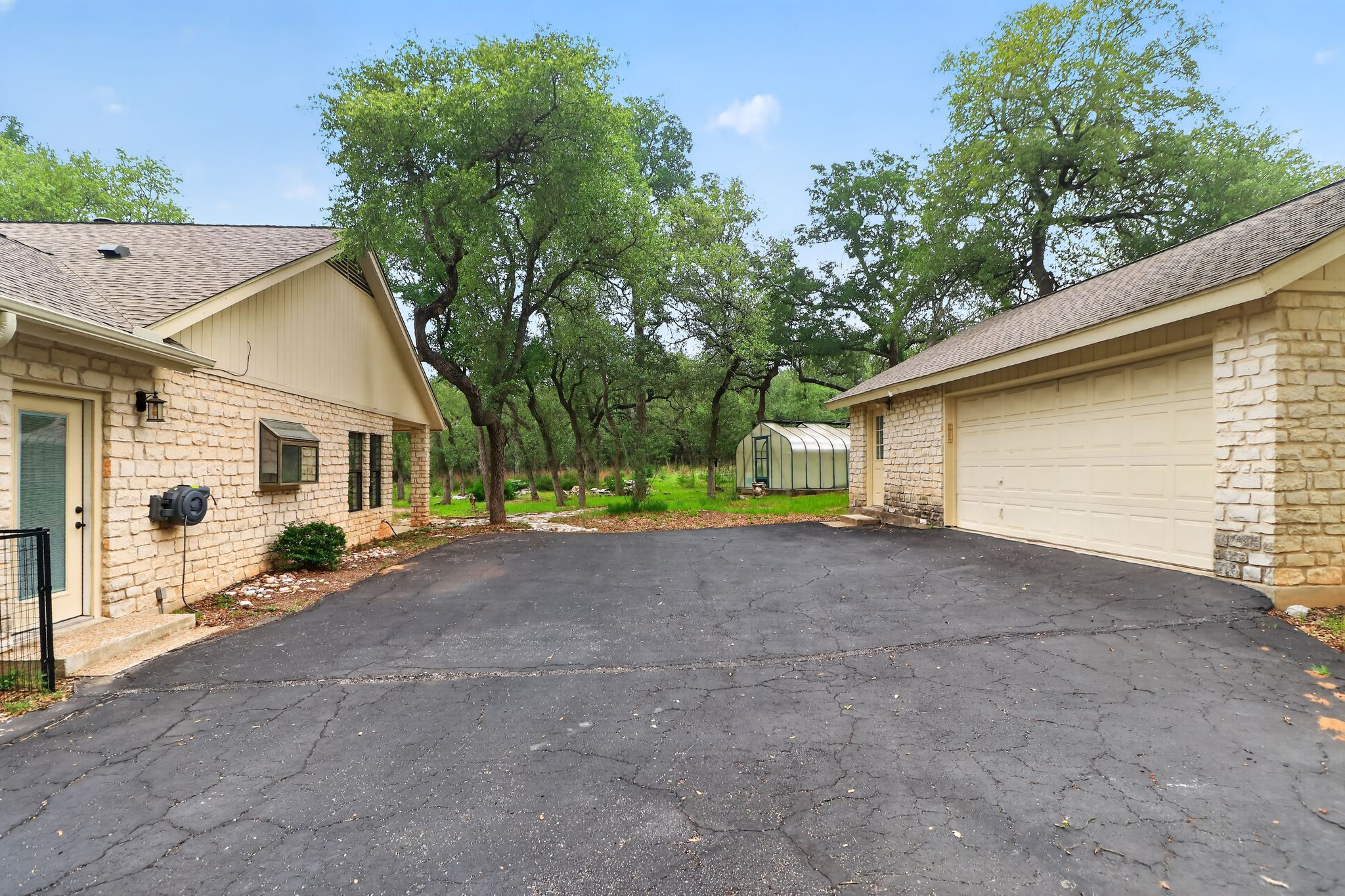 128 Mockingbird Lane Georgetown, TX 78633 - Photo 24 of 32 Detached Garage with Extra Parking Between
