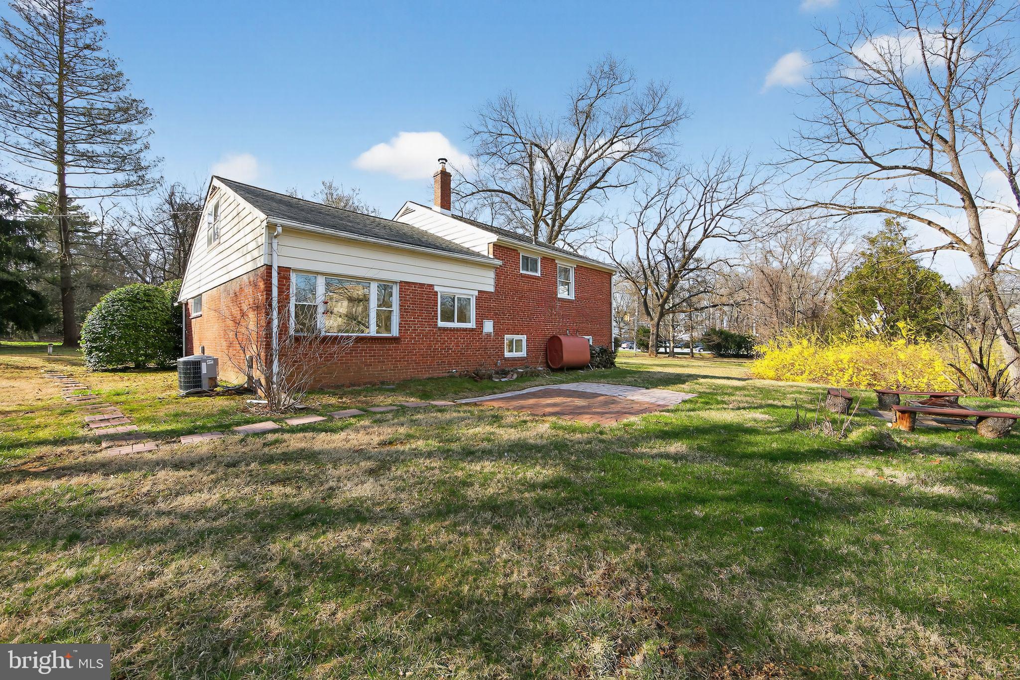 1567 Sugartown Road Paoli, PA 19301 - Photo 14 of 32 a view of a house with a yard