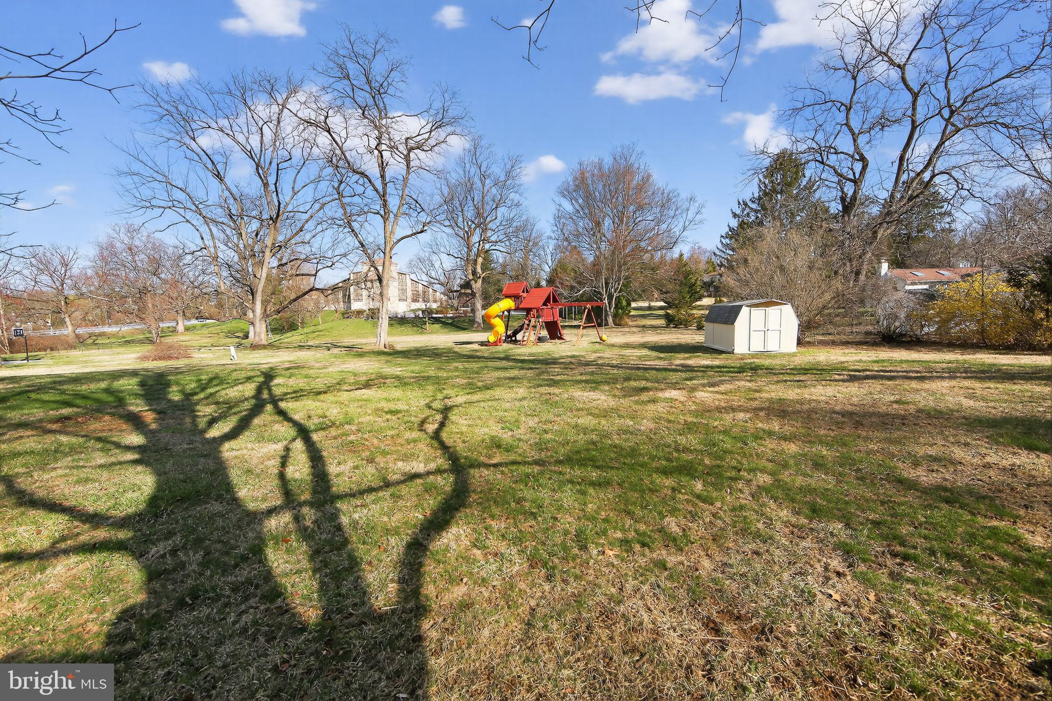 1567 Sugartown Road Paoli, PA 19301 - Photo 30 of 32 a view of yard with swimming pool and outdoor seating